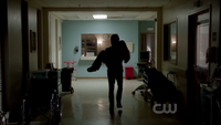 Damon carrying Elena out of hospital