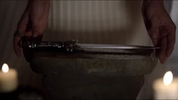 Genevieve enchants a sacrificial knife