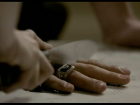 John's ring cut off when Katherine was acting as Elena.