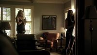 Same window behind Caroline, to the right is the side window, the fireplace is behind Elena on the right