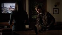 Same view, different angle. Kol is sitting on the back of the leather couch