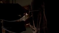 Rebekah presses the dagger to Kol's back