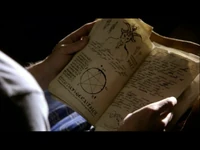 Jeremy reading the journal.