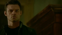 Elijah watches Hayley die