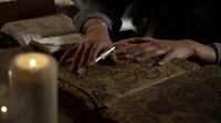 Normal TheOriginals202-0310.jpeg (351 KB) Davina studying Esther's grimoire writing down her own