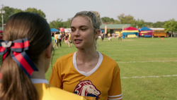 Lizzie involves herself with the game.