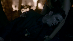 Elijah is staked by a branch to stop the spell