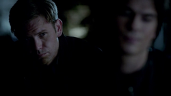 Alaric watches Damon