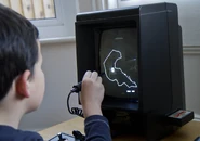 Cparsonsuk's son playing with the Light Pen and Art Master