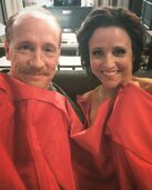 Julia Louis-Dreyfus and Matt Walsh using a gown as a blanket. (October 12, 2016)