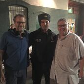 Show runner David Mandel, director Billy Kimball, and a police officer (actor). (November 4, 2016)