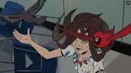 The inmate lets loose the birds in her hair.