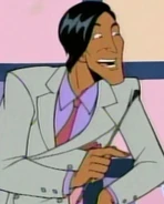Pete as a game show host with his tanned skin.