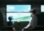 Naoyuki và Tomoya lúc xưa khi hai cha con trên chuyến tàu.