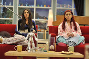 Tori and Cat watch in shock as Mona Patterson's house has been burned down in .