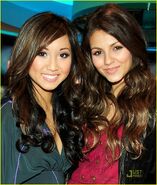 With Brenda Song