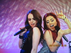Cat and Jade singing.