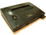 The rare Neo Geo AES home console with memory card inserted