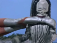 Patada giratoria estranguladora (Kubishime Kick)