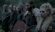 Lagertha, Rollo, Ragnar, and Floki prepare for battle in Answers in Blood