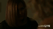 Allison shoving Kelly through the upstairs window
