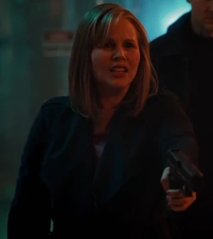 Grace holding Susie at gunpoint