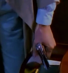 A close-up of Helen's gun during her villainous mission
