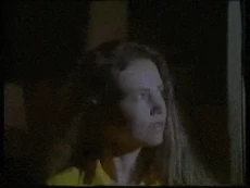 The evil Mary Lou transforming into a werewolf