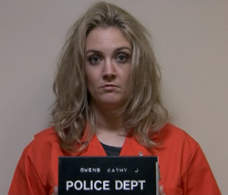 Kathy's booking photo after her arrest