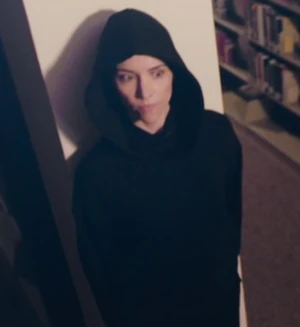 Valerie under her heel persona at the school's library