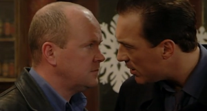 Phil prepares to fight Steve as they square off in The Queen Vic (2000).