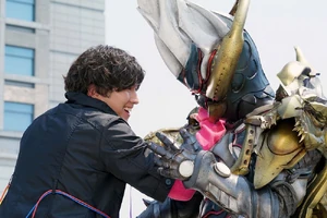 Parado sacrifices himself to take down Gamedeus.