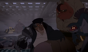 Silver scolding his fellow mutineers for almost blowing the cover.