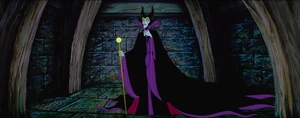 Maleficent about to show the good fairies Aurora's unconscious body after she had pricked her finger on a spindle.