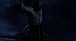 Van Helsing whipping out a grappling hook gun and fires a bolt right through Hyde's belly.