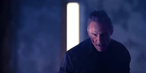 Grigori gaining the upper hand in the fight.