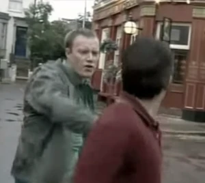 Trevor Morgan about to lash out at Little Mo's brother-in-law Garry Hobbs.