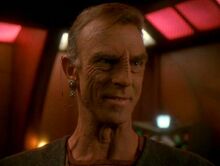 Dukat posing as Anjohl Tennan