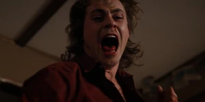 Billy beating up Steve.