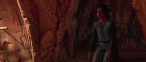 Boba stares in horror as he witnesses his father's death at the hands of Jedi Master Mace Windu on Geonosis.