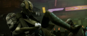 Wolffe grappled with Ventress, grabbing her from behind and lifting her off her feet.