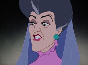 Lady Tremaine watching her daughters rip Cinderella's dress apart.