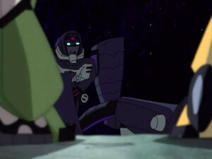 Shockwave, as a miscolored Longarm, at the mercy of Bumblebee and Bulkhead.