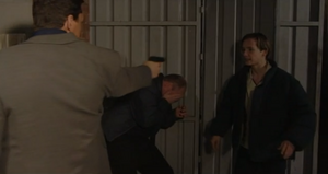 Phil is attacked by Dan just as Jamie walks in on the scene (2001).