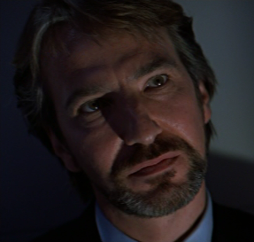 Hans Gruber caught off guard by John McClane.