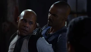 Walker being arrested.