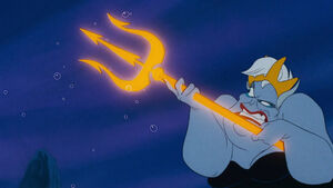 Ursula attempting to kill Eric with the trident.