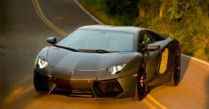 Lockdown's vehicle mode, a matte black Lamborghini Aventador LP 700-4 Coupe.