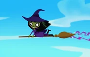 Wilhelmina flying with her broom.