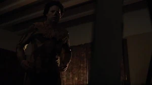 Kent realizing his costume has turned into flesh